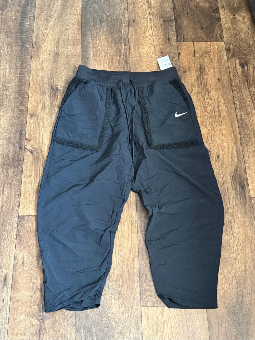 Nike Black Cropped Track Pants with Front Patch Pockets